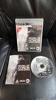 Front view of PS3 Medal of Honor Limited Edition case, booklet and disc