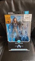 Front view of sealed McFarlane DC Multiverse Aquaman Stealth Suit figure with Topo in packaging