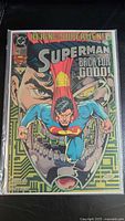 Full front cover of Superman #82 in bag and board