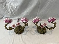 Pair of brass sconces front view
