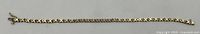 Full view of Birks 14k gold diamond tennis bracelet