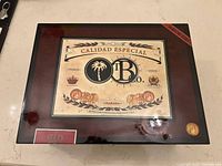 Top view of closed humidor showing Calidad Especial label and gloss finish