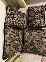 All four pillows showing both patterns and shapes
