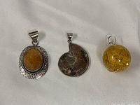 Front view of all three pendants side by side