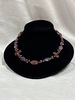 Necklace front view on display bust