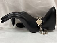 Full bracelet draped on display hand