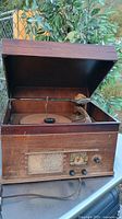 Full view of radio phonograph with lid open
