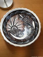 Top view showing full bird and flower motif inside bowl
