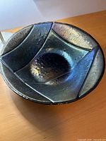 Top view of iridescent fused glass bowl
