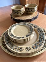 Entire stacked set showing plates, bowls and pattern