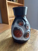 angled view highlighting glaze colors and texture