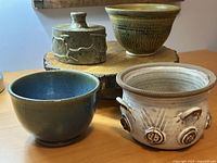 Group shot of all four pottery pieces