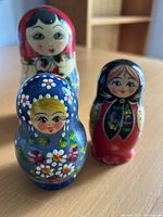 Front view of three main outer dolls