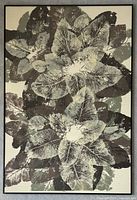 Full view of framed canvas print showing leaf pattern