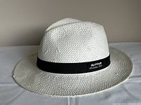 Overall view showing crown, brim, and logo band