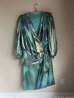 Full view of blouse and skirt hanging together