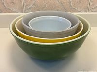 Stacked view showing all four bowls nested