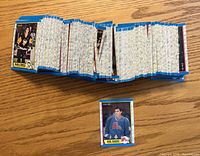 Stack of cards plus Joe Sakic rookie card front