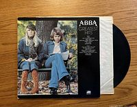 Front jacket with record partially visible