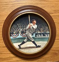 Front view of Babe Ruth collector plate in wood frame