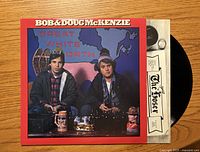 Front cover, partial view of record and inner sleeve