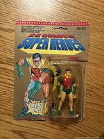 Front of blister-carded Robin figure showing artwork and intact figure