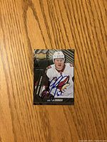 Front of autographed Lawson Crouse Upper Deck card