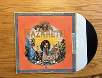 Front cover of Nazareth Rampant LP with vinyl partially visible