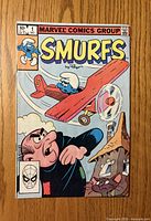 Front cover showing Marvel Smurfs #1, price, date, artwork