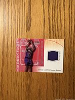Front of Vince Carter Fleer Northern Flights card with jersey swatch