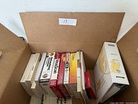 Overall view of boxed software and manuals inside carton
