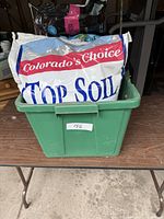 Colorado's Choice Top Soil bag in green tote