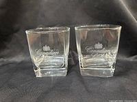 Front view of both etched Canadian Club glasses
