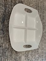 Top view showing four sections and handles