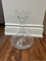 Front view showing full decanter body and funnel placed on top