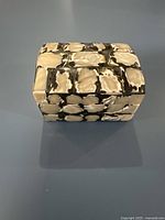 Closed box top view showing shell inlay pattern