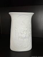 Front view showing relief scene and overall shape