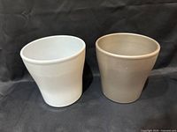 Front view of both planters showing colors and shape