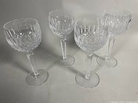 Group shot of four Waterford Lismore crystal wine glasses