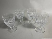 All four Waterford crystal stemware glasses showing overall condition