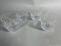 Four Waterford crystal glasses grouped
