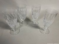 Four Waterford crystal stemware glasses grouped