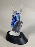 Rear view of Swarovski Isadora figurine on black display base