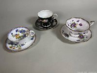 All three teacup and saucer sets displayed