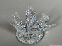 Full view of Swarovski crystal sailing ship on mirror base