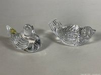 Both Waterford crystal figurines side by side showing overall form