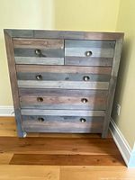 Front view showing full dresser, five drawers and finish