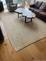Full view of jute rug in living room setting