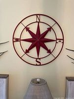 Full view of compass wall decor mounted on wall