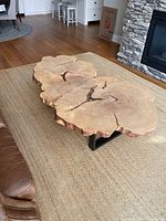 Full view of live edge coffee table in room setting